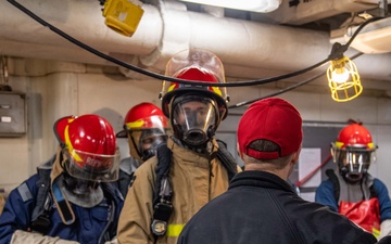 USS Ronald Reagan (CVN 76) Sailors participate in damage control drill