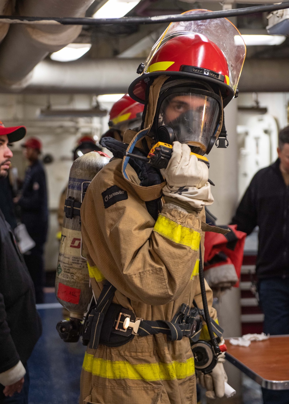 USS Ronald Reagan (CVN 76) Sailors participate in damage control drill