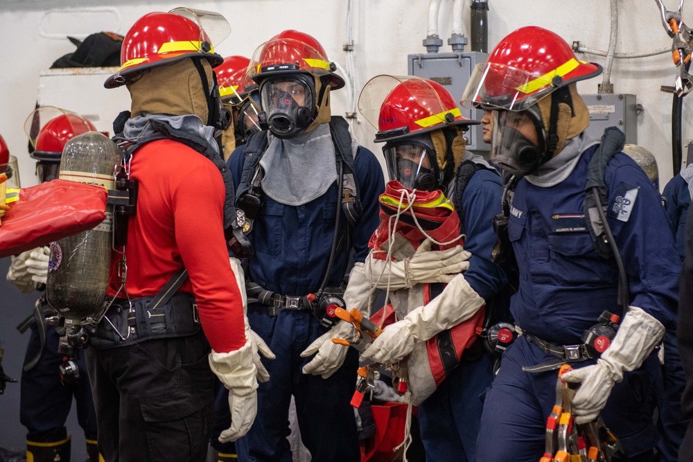 Headline: USS Ronald Reagan (CVN 76) Sailors participate in damage control drill