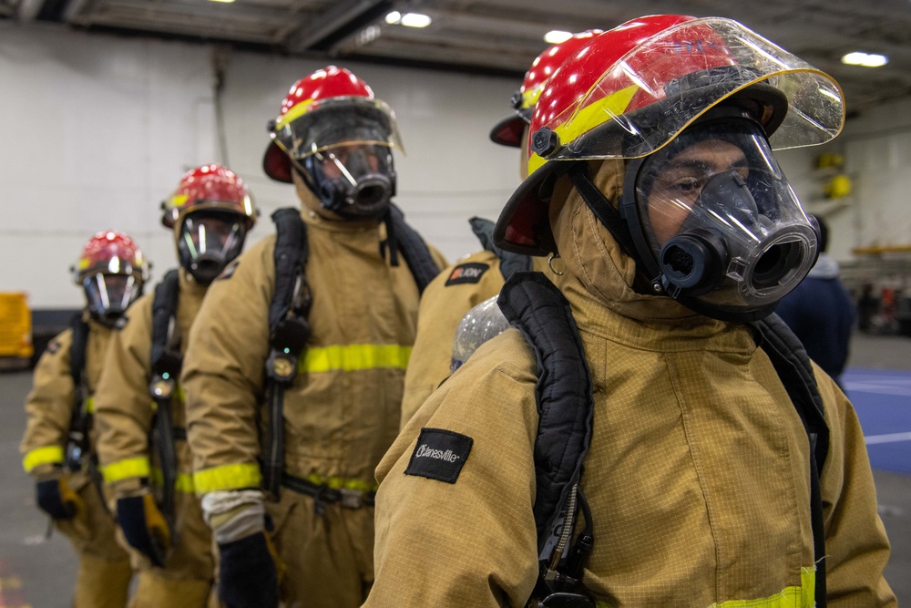 USS Ronald Reagan (CVN 76) Sailors participate in damage control drill