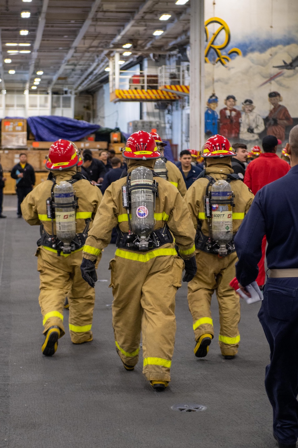 USS Ronald Reagan (CVN 76) Sailors participate in damage control drill