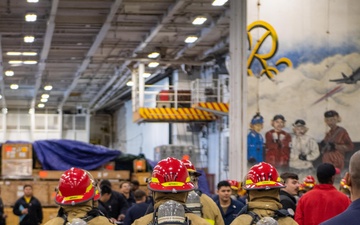 USS Ronald Reagan (CVN 76) Sailors participate in damage control drill