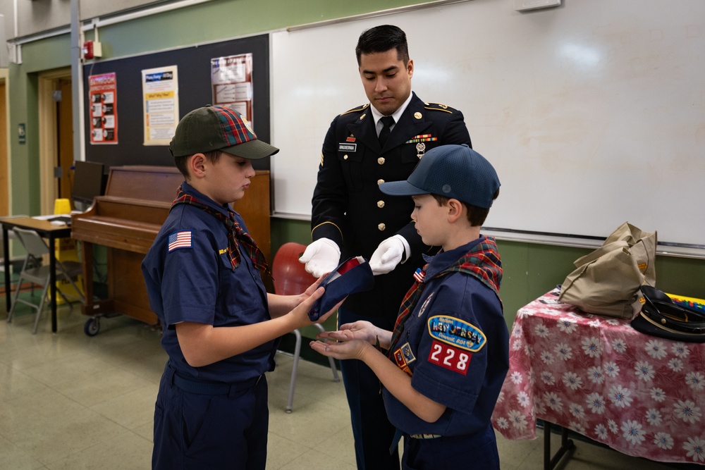 New Jersey National Guard Recruiters Teach Cub Scouts How to Fold The American Flag