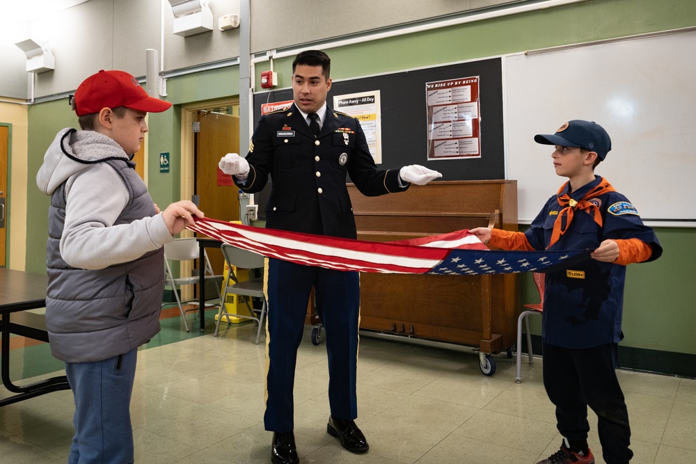 New Jersey National Guard Recruiters Teach Cub Scouts How to Fold The American Flag