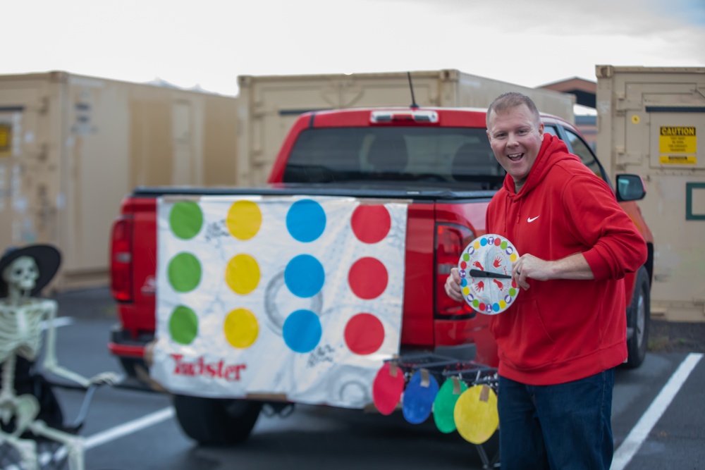 Maj. Tatalone Poses With His Truck During a Trunk-or-Treat