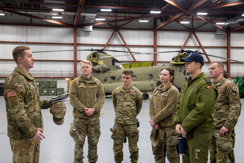 1st. Lt. Atwood Leads Military Members on a Tour of an Aircraft Hangar