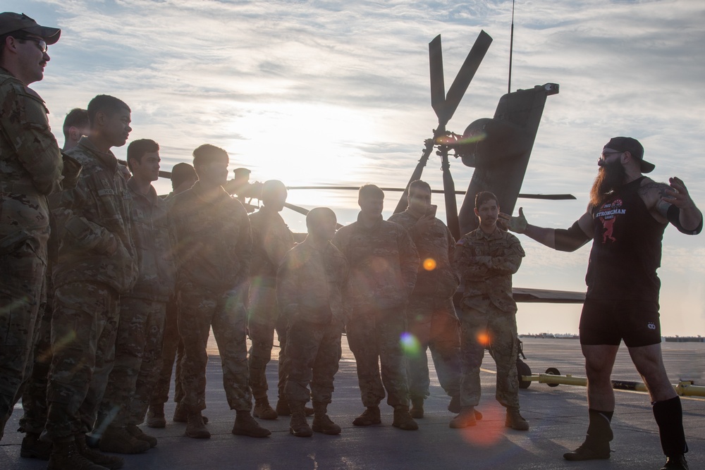 Nicolai Myers Addresses Soldiers After Pulling an AH-64D Apache Helicopter