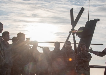 Nicolai Myers Addresses Soldiers After Pulling an AH-64D Apache Helicopter