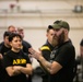 A Holistic Health &amp; Fitness Instructor Addresses Soldiers During Physical Training