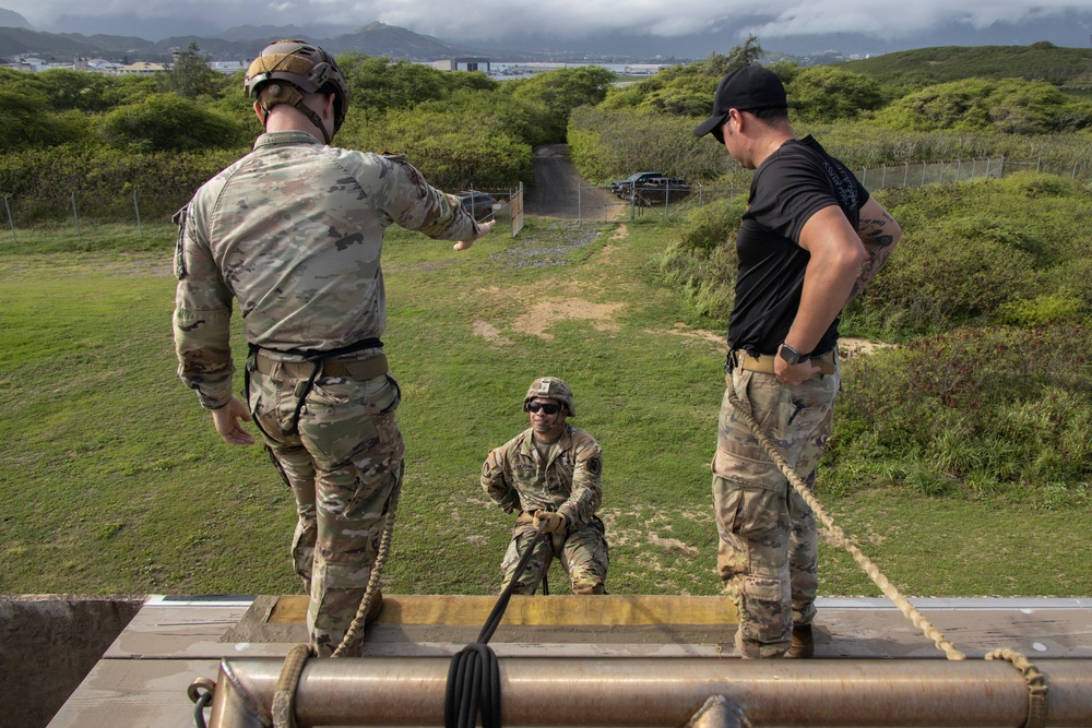 Belay On: U.S. Soldiers conduct tower rappelling operations at MCBH