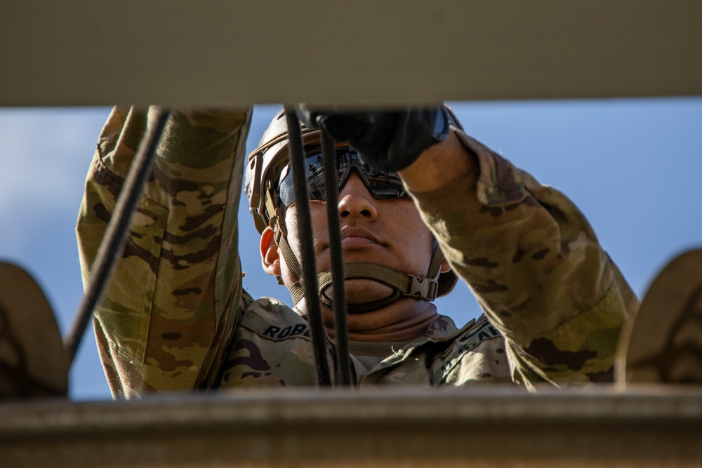 Belay On: U.S. Soldiers conduct tower rappelling operations at MCBH