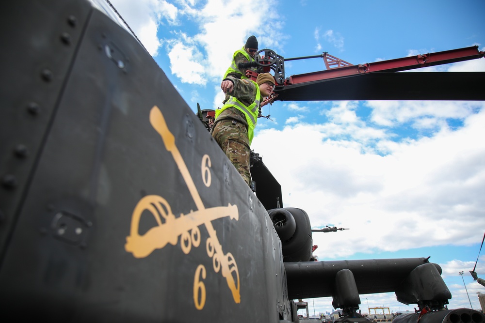 Soldiers Prepare to Transport a AH-64D Apache Helicopter