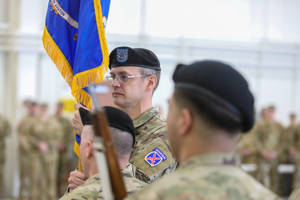 Command Sgt. Maj. Mierta Holds the Battalion Guideon