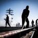 Nimitz Sailors Move Catapult Covers