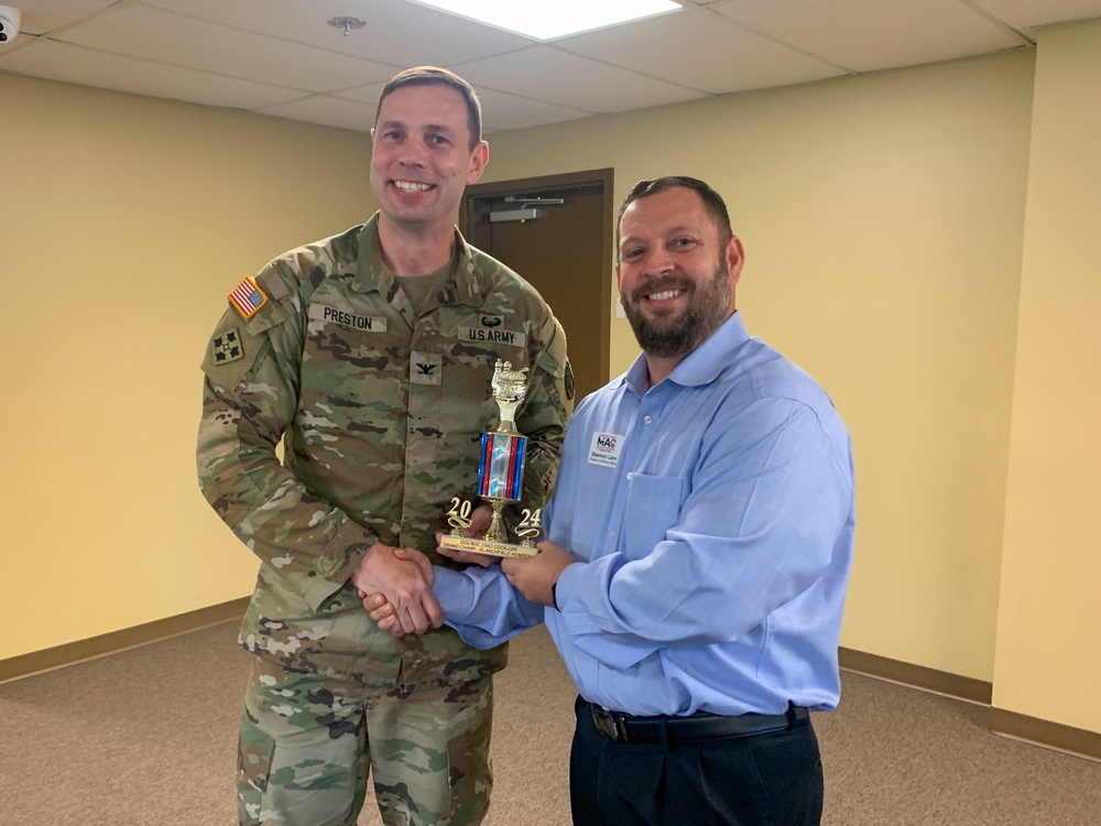 BACH Commander Receives Trophy