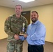 BACH Commander Receives Trophy