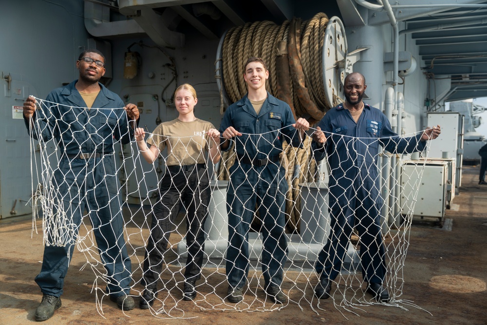 USS Wasp (LHD 1) Sailors Build a Soccer Net for a Community Service Event