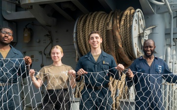 USS Wasp (LHD 1) Sailors Build a Soccer Net for a Community Service Event