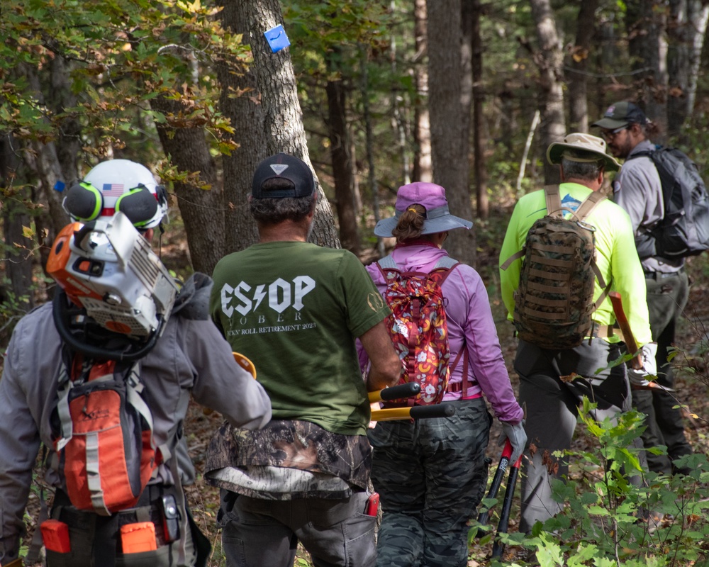 Volunteers and rangers participate in National Public Lands Day cleanup