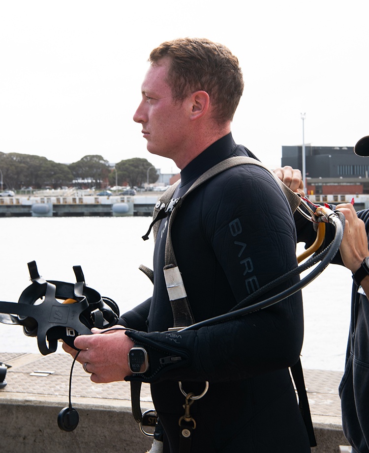 Three NUWC Division Newport engineering agents perform first modernizations to submarine in Australia