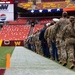 U.S. service members participate in Salute to Service NFL game