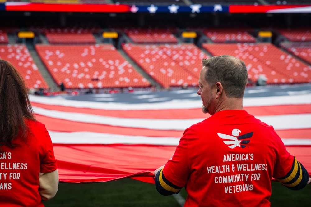 U.S. service members participate in Salute to Service NFL game