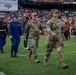 U.S. service members participate in Salute to Service NFL game