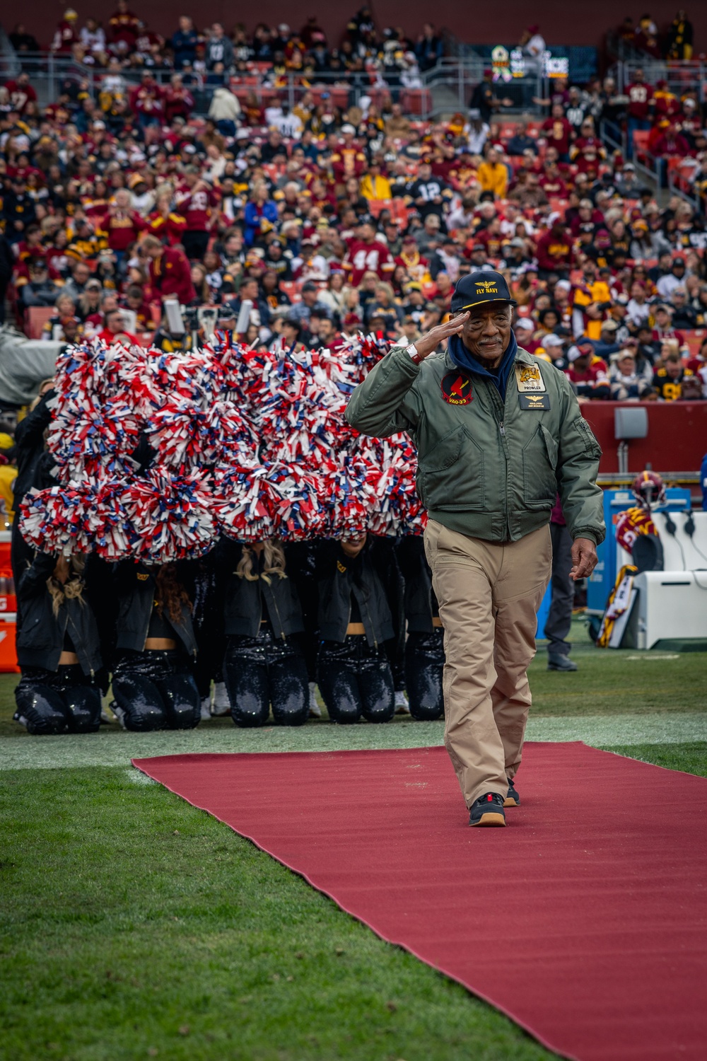 U.S. service members participate in Salute to Service NFL game