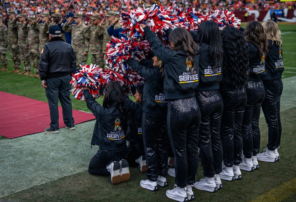 U.S. service members participate in Salute to Service NFL game