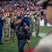 U.S. service members participate in Salute to Service NFL game