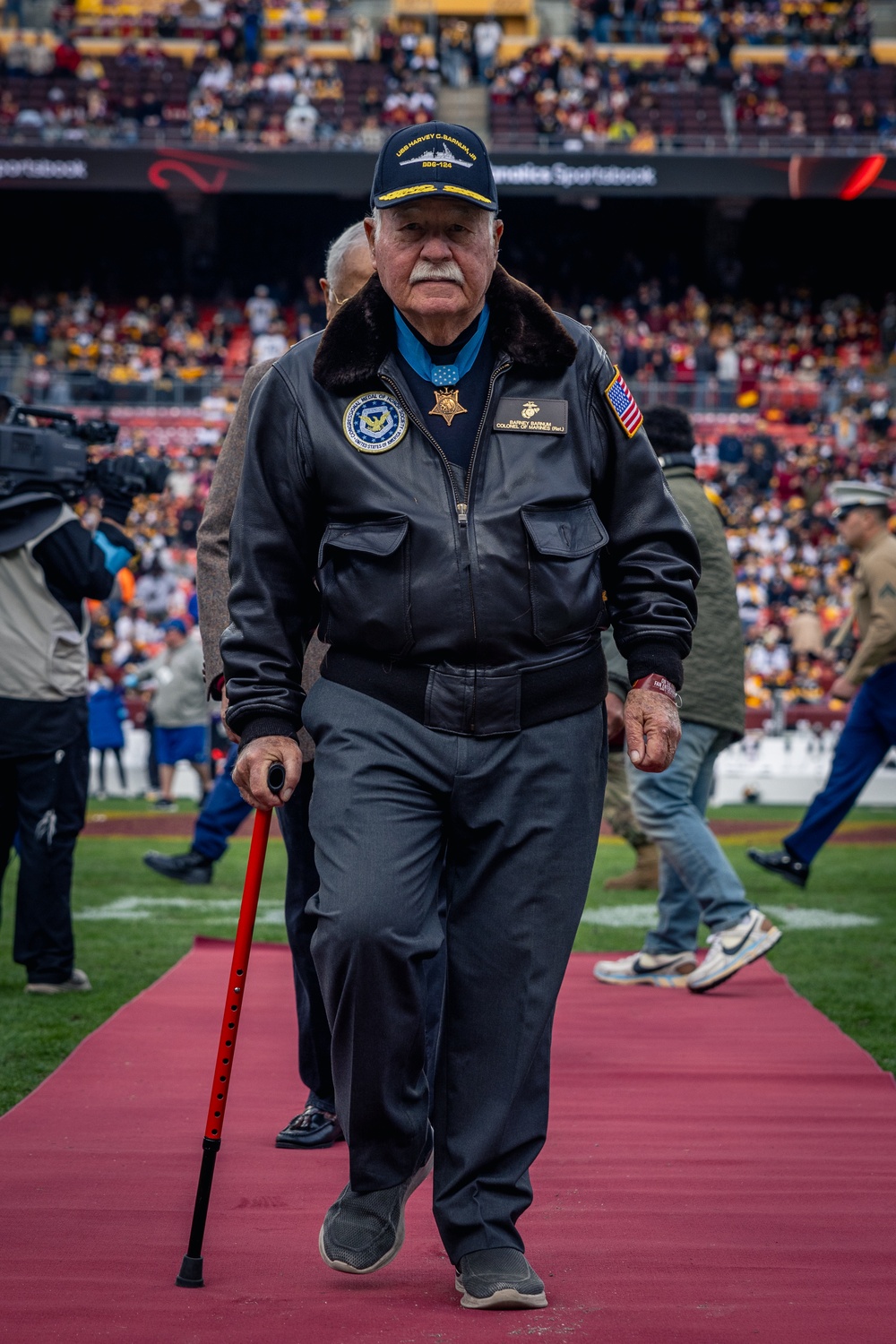 U.S. service members participate in Salute to Service NFL game