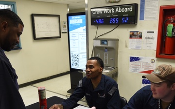 USS John C. Stennis (CVN 74) Sailors sell MWR Tickets