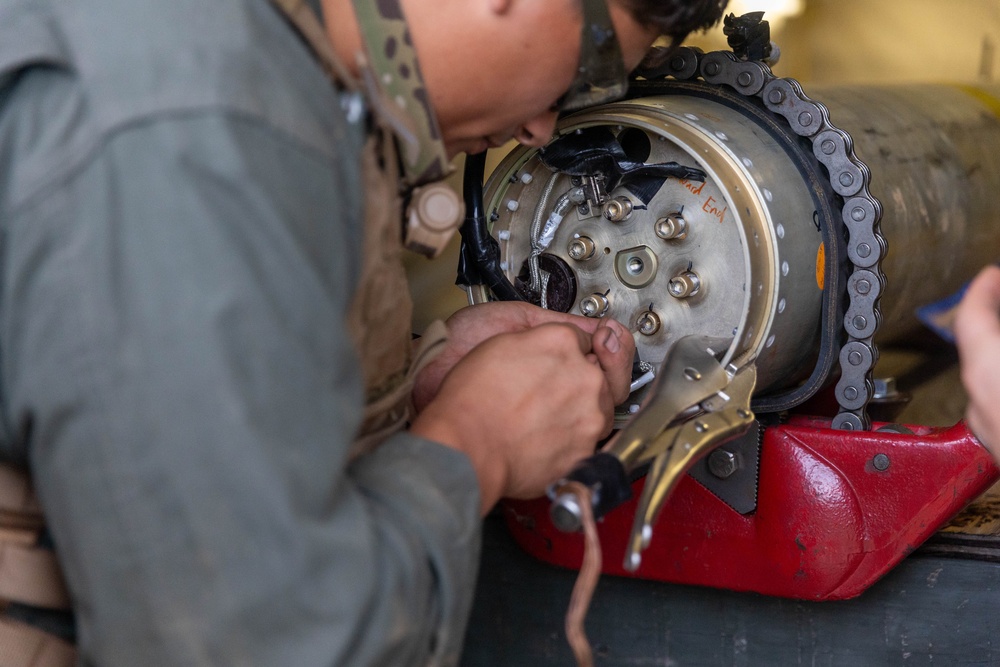 MWSS-172 explosive ordnance disposal technicians test HIMARS missile functionality