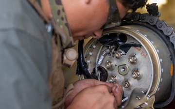 MWSS-172 explosive ordnance disposal technicians test HIMARS missile functionality