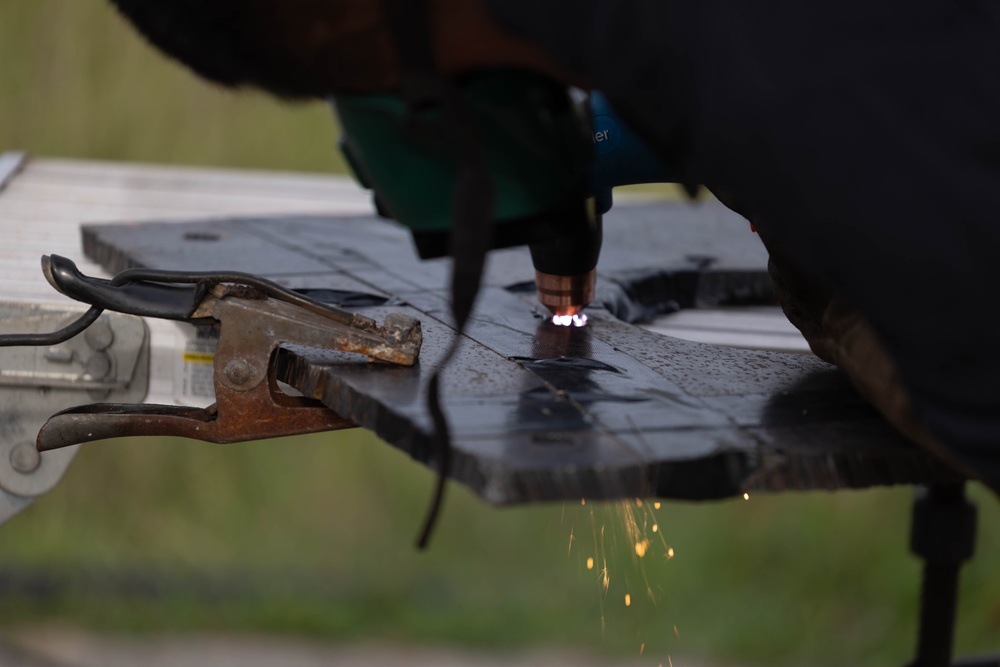 MWSS-172 explosive ordnance disposal technicians test HIMARS missile functionality