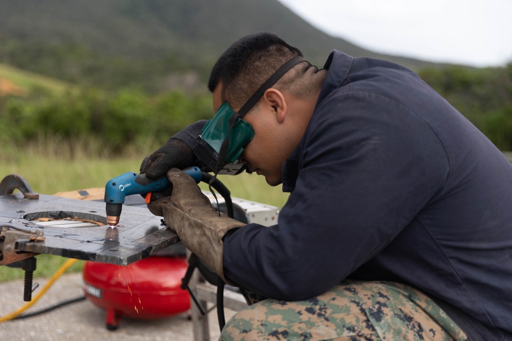 MWSS-172 explosive ordnance disposal technicians test HIMARS missile functionality