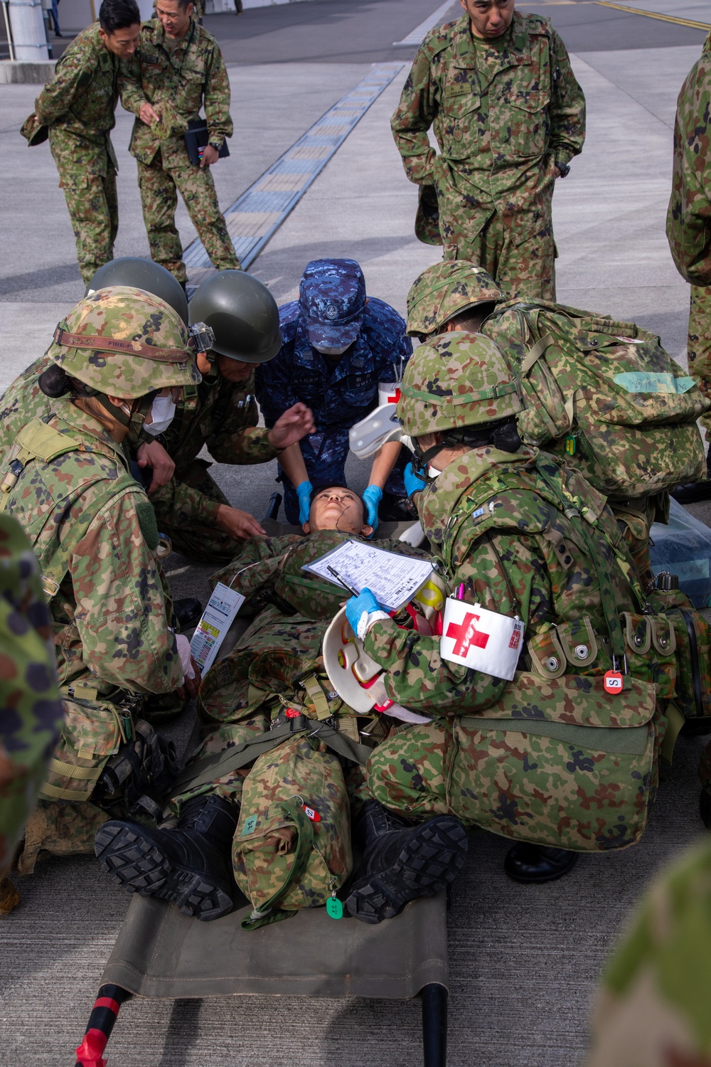 Keen Sword 25: JGSDF and JMSDF members conduct a simulated MEDEVAC
