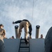 Sailors with USS John Basilone (DDG 122) visit USS New Jersey