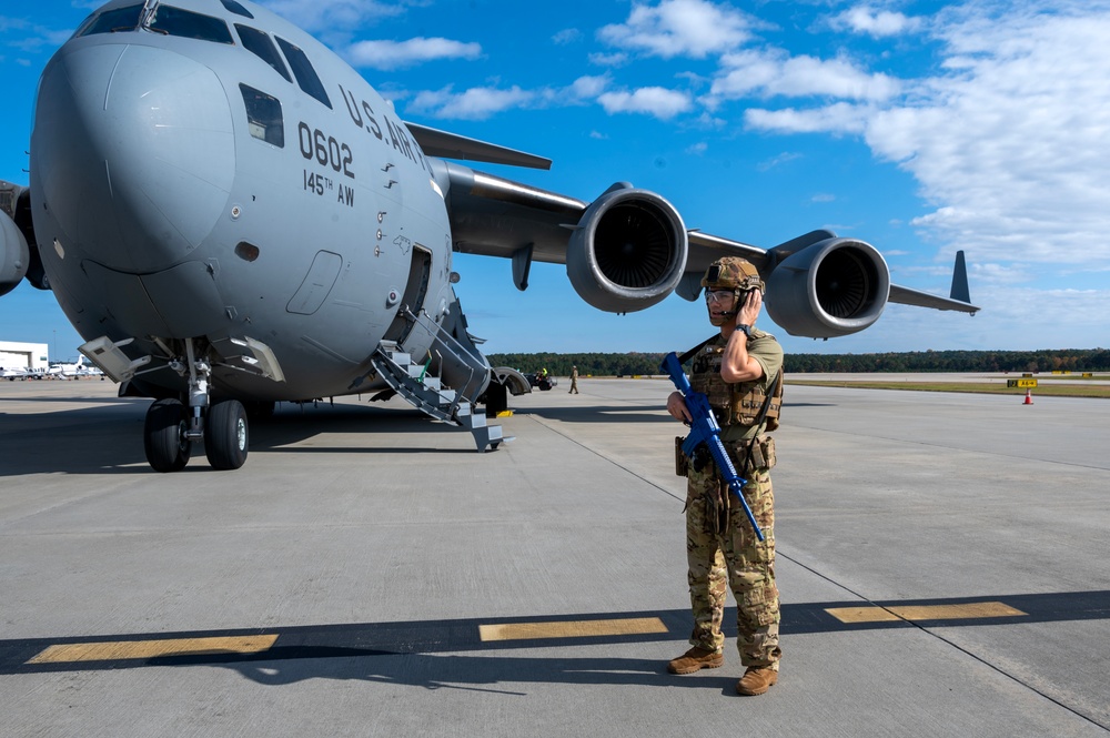 Airmen and Soldiers of the NCNG load UH-72B Lakota onto C-17 Globemaster III