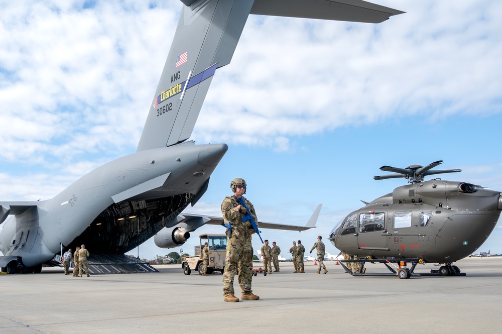 Airmen and Soldiers of the NCNG load UH-72B Lakota onto C-17 Globemaster III