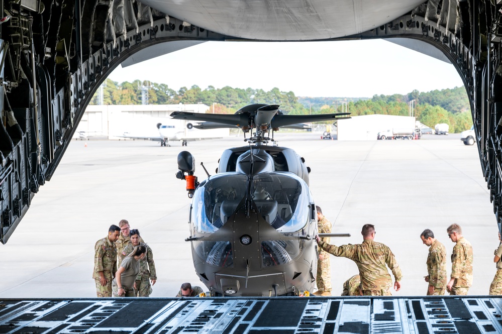 Airmen and Soldiers of the NCNG load UH-72B Lakota onto C-17 Globemaster III