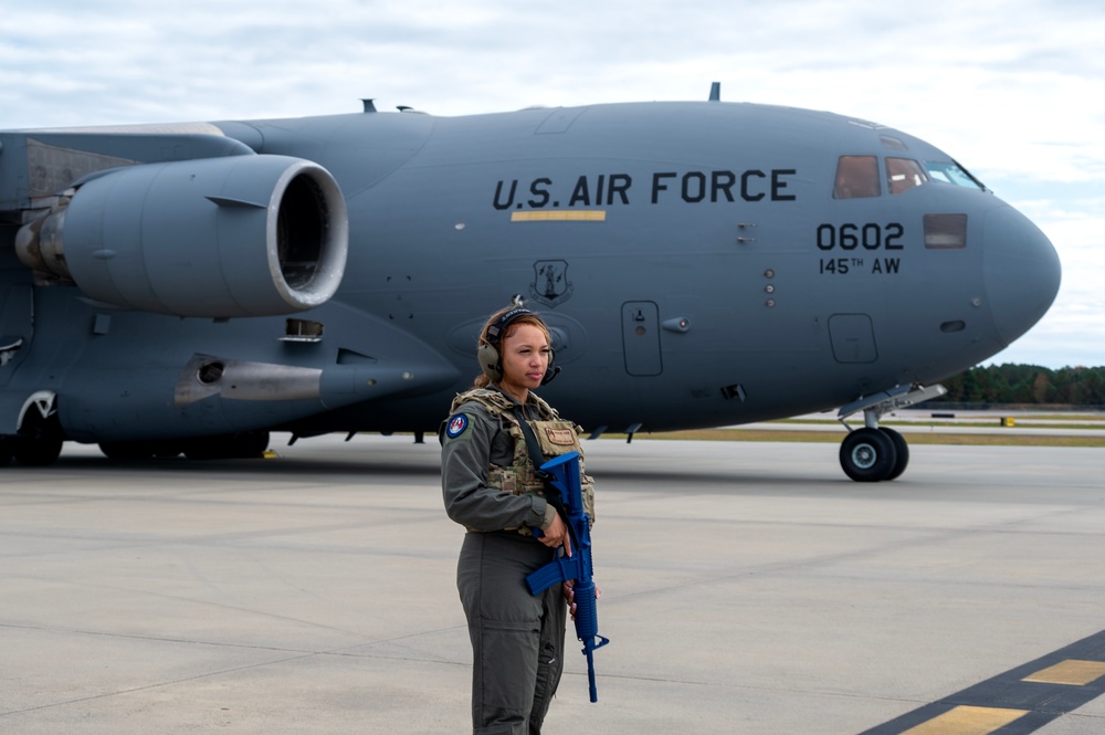 Airmen and Soldiers of the NCNG load UH-72B Lakota onto C-17 Globemaster III