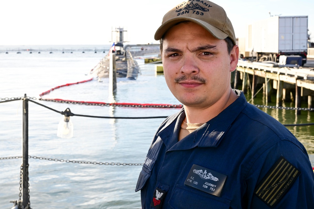 USS Albany Sailor saves two people from burning building