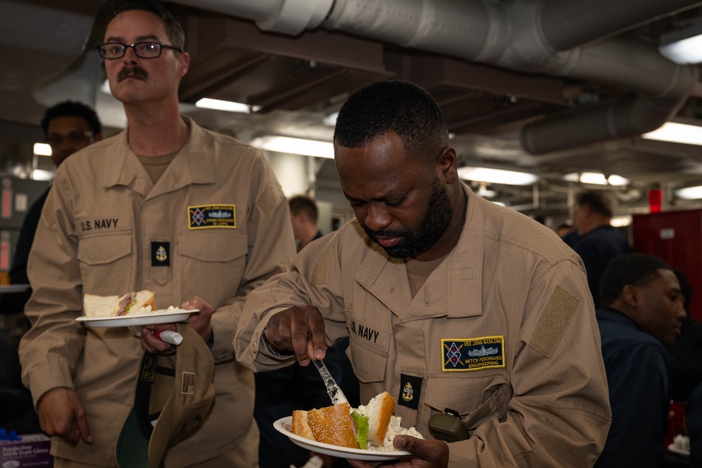 Sailors with USS John Basilone DDG 122 Meet with Retired Service Members of USS Basilone DDE 824