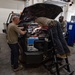 726th EMSS commander pops the hood with vehicle maintenance Airmen