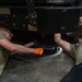 726th EMSS commander pops the hood with vehicle maintenance Airmen