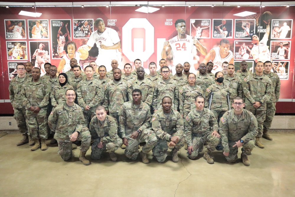 Group of trainees attend OU men's basketball game