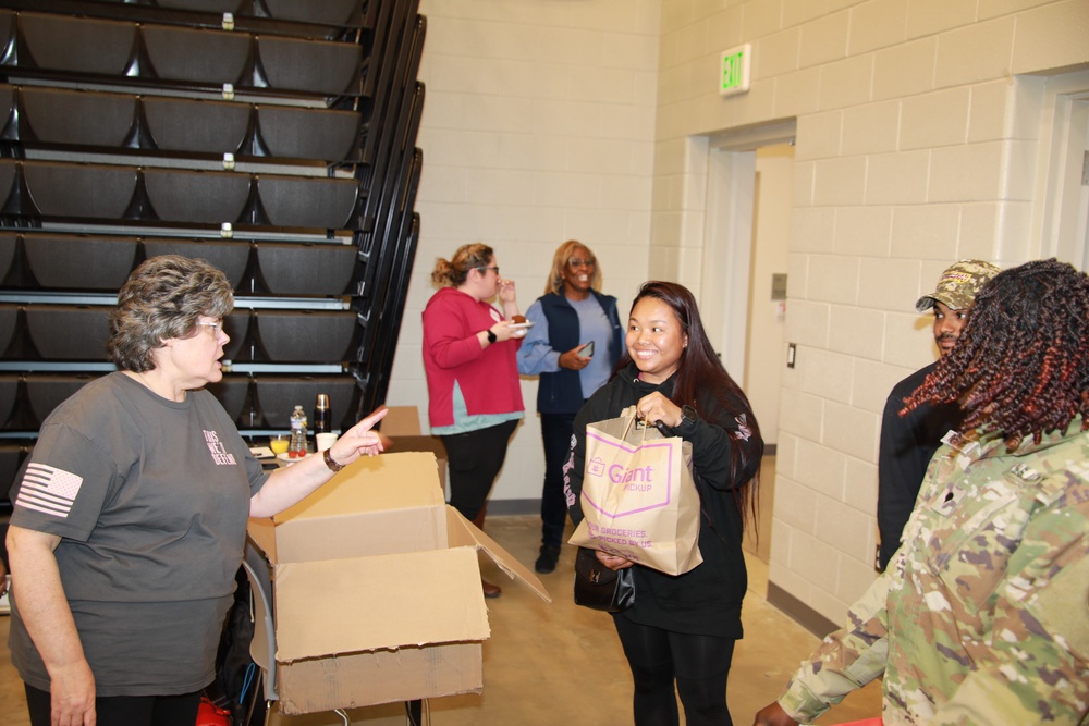 Service Member Receives a Turkey and Food Basket (3 of 3)