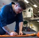 Sailors preform Maintinance onboard USS Tripoli