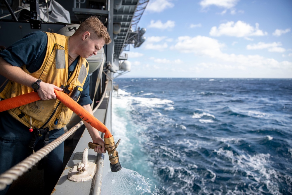 Sailors preform Maintinance onboard USS Tripoli